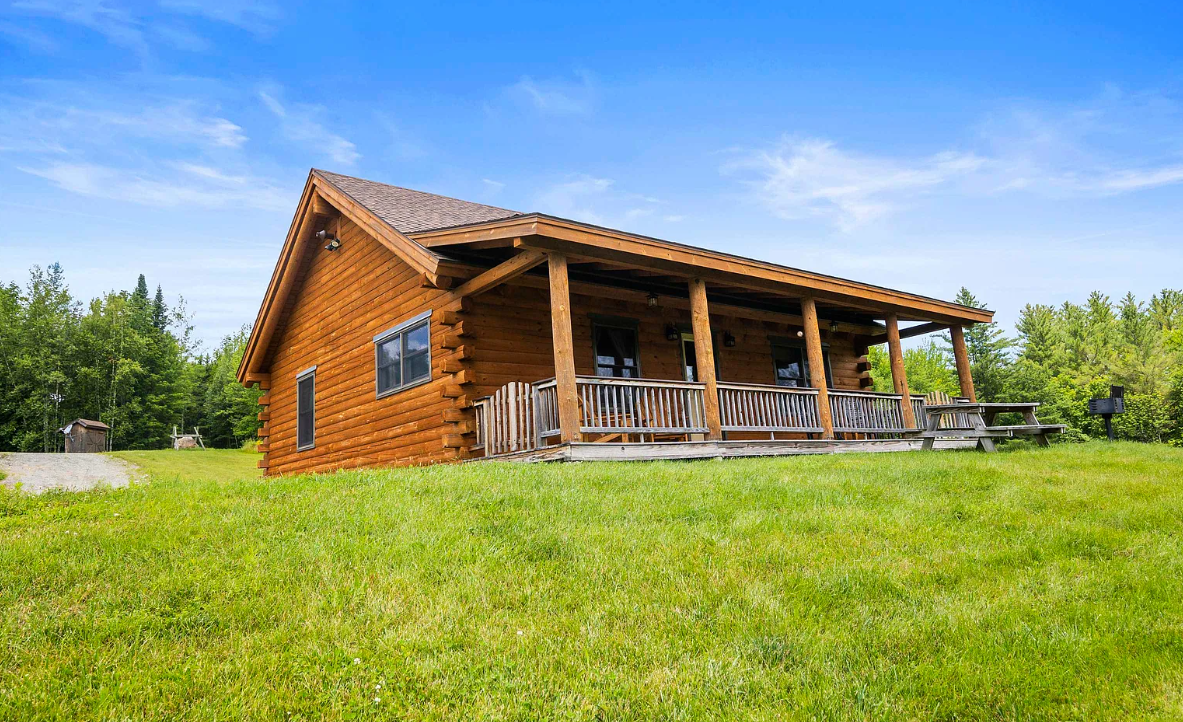 Exterior image of a Muddy Moose log cabin in Morrisville, VT